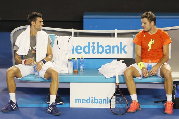 MELBOURNE, AUSTRALIA - JANUARY 14:  Novak Djokovic of Serbia talks with Stan Wawrinka of Switzerland during a practice session ahead of the 2016 Australian Open at Melbourne Park on January 14, 2016 in Melbourne, Australia.  (Photo by Michael Dodge/Getty Images)