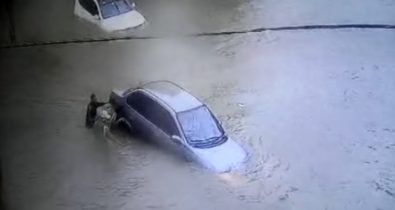 Carros boiando e ruas alagadas: veja os estragos da chuva na manhã de hoje