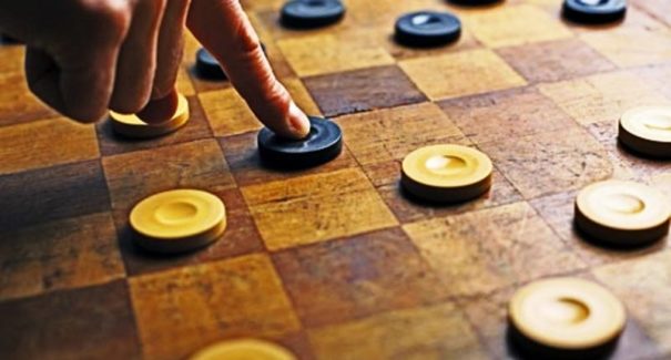 Jogo de damas e futebol: tudo a ver