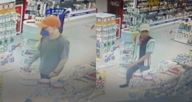 Assaltante usa máscara de proteção durante roubo em farmácia