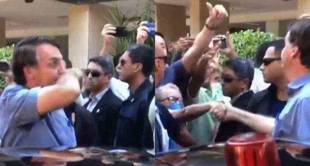 No Sudoeste, Bolsonaro limpa nariz e, em seguida, aperta mãos de apoiadores