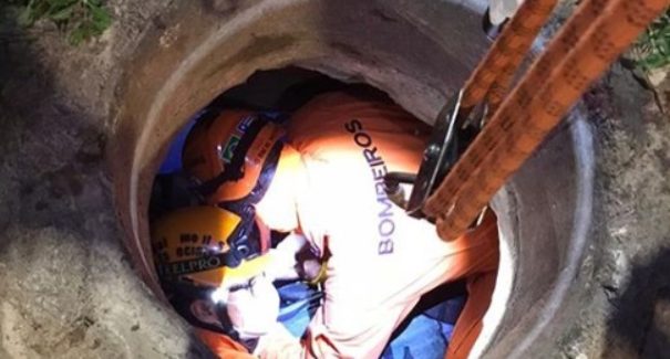 Homem que caiu em bueiro após acidente é resgatado pelos Bombeiros